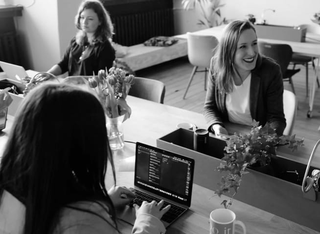 A group of colleauges enjoying working together.